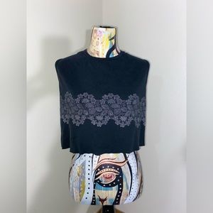 Grunge floral crop top/tank. 
Size: S. Reworked/up cycled. Raw cut bottom hem.